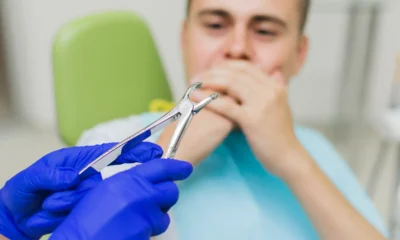 uomo non vuole togliere un dente del giudizio