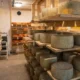 Foto de una forma de queso en maduración relacionada con quanto pesa una forma di grana padano.